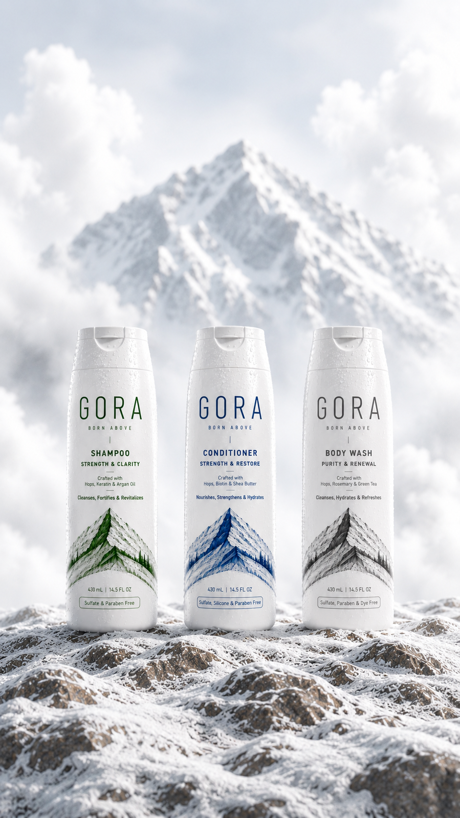 GORA shampoo, conditioner and body wash standing in fresh snow before a snowbound peak