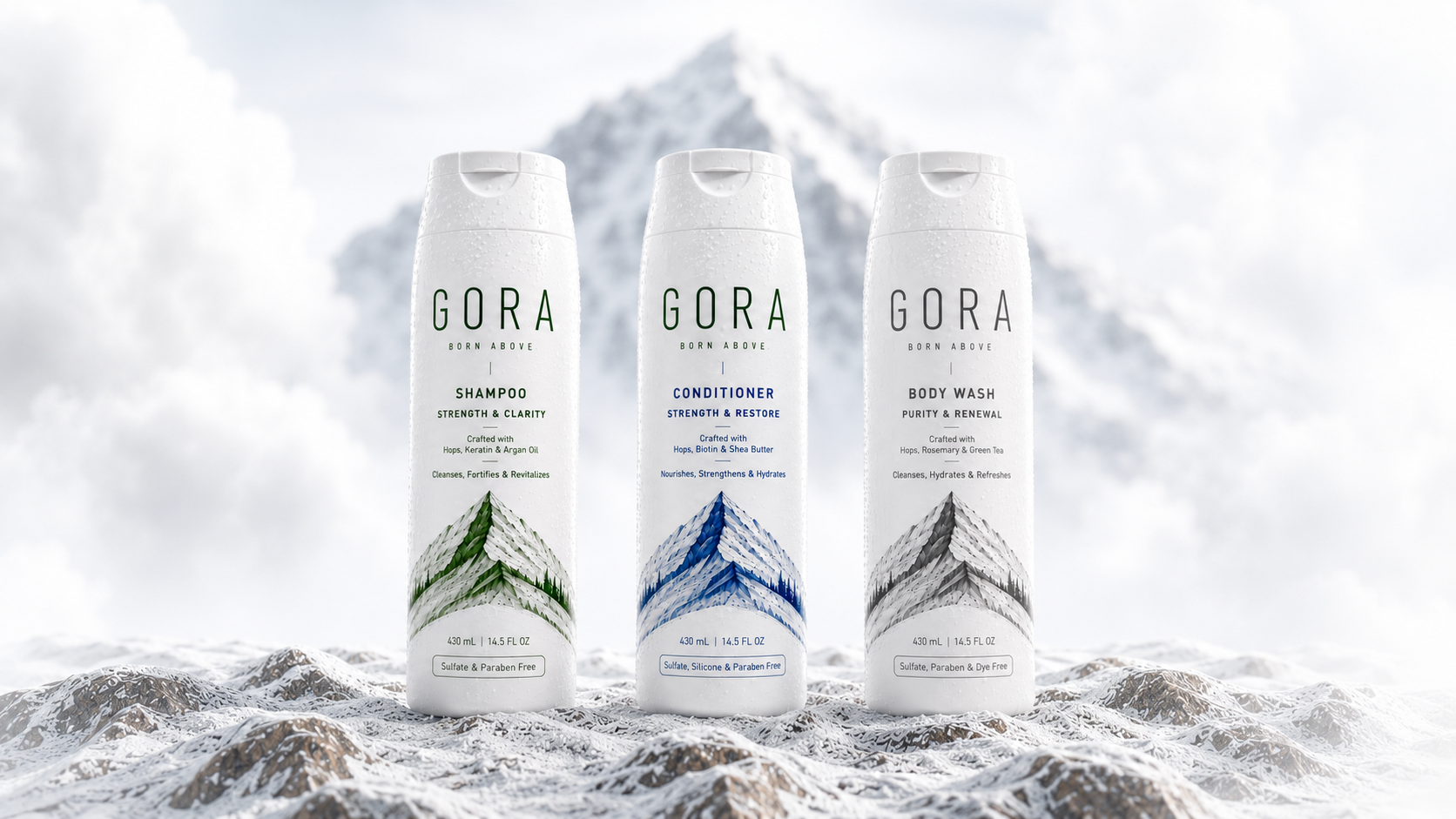 GORA shampoo, conditioner and body wash standing in fresh snow before a snowbound peak